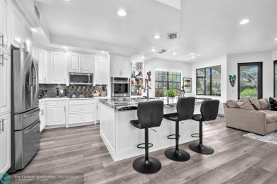 Live the dream in this stunningly beautiful, renovated coach on Parkland Golf Club in Florida - for sale on GolfHomes.com, golf home, golf lot