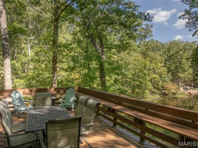 Escape to your own lakeside paradise at this super cute chalet on Innsbrook Resort Golf Course in Missouri - for sale on GolfHomes.com, golf home, golf lot