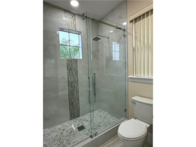YOU'LL LOVE YOUR LIFE WITH PEACEFUL LAKE VIEWS of BEAUTIFUL on Gateway Golf and Country Club in Florida - for sale on GolfHomes.com, golf home, golf lot