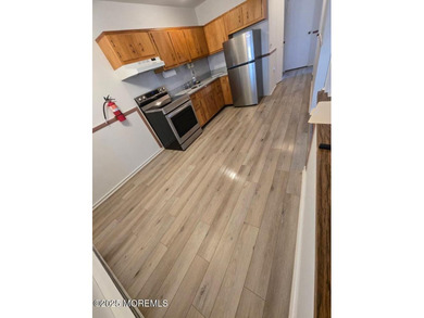 The spacious 1 bedroom unit offers comfort and fun amenities on Keswick Village Golf Course in New Jersey - for sale on GolfHomes.com, golf home, golf lot