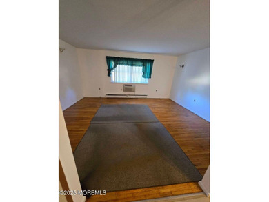 The spacious 1 bedroom unit offers comfort and fun amenities on Keswick Village Golf Course in New Jersey - for sale on GolfHomes.com, golf home, golf lot