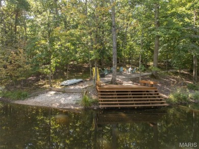Escape to your own lakeside paradise at this super cute chalet on Innsbrook Resort Golf Course in Missouri - for sale on GolfHomes.com, golf home, golf lot