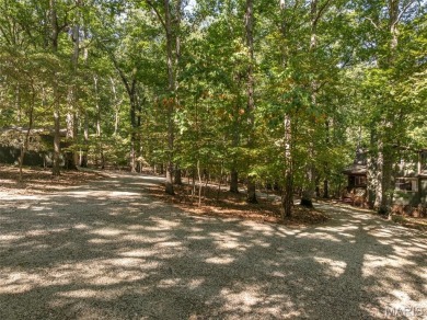 Escape to your own lakeside paradise at this super cute chalet on Innsbrook Resort Golf Course in Missouri - for sale on GolfHomes.com, golf home, golf lot