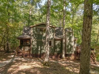 Escape to your own lakeside paradise at this super cute chalet on Innsbrook Resort Golf Course in Missouri - for sale on GolfHomes.com, golf home, golf lot