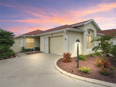 MOVE RIGHT INTO THIS COURTYARD VILLA POOL HOME in the Villas of on El Diablo Executive Golf Course in Florida - for sale on GolfHomes.com, golf home, golf lot