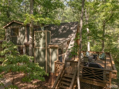 Escape to your own lakeside paradise at this super cute chalet on Innsbrook Resort Golf Course in Missouri - for sale on GolfHomes.com, golf home, golf lot