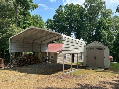 Located on a corner lot in Pine Point, this 2 bedroom, 1.5 bath on Tennessean Golf Club in Tennessee - for sale on GolfHomes.com, golf home, golf lot