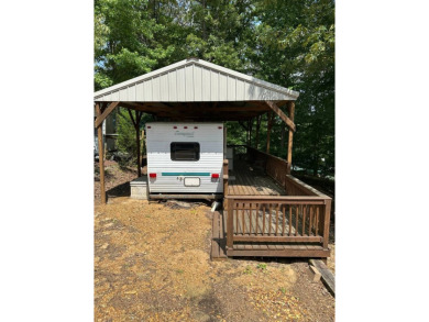 Located on a corner lot in Pine Point, this 2 bedroom, 1.5 bath on Tennessean Golf Club in Tennessee - for sale on GolfHomes.com, golf home, golf lot