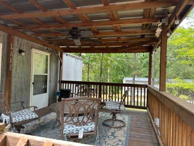 Located on a corner lot in Pine Point, this 2 bedroom, 1.5 bath on Tennessean Golf Club in Tennessee - for sale on GolfHomes.com, golf home, golf lot