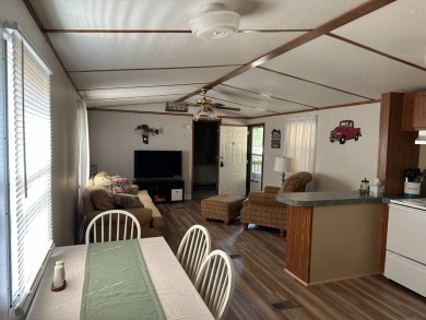Located on a corner lot in Pine Point, this 2 bedroom, 1.5 bath on Tennessean Golf Club in Tennessee - for sale on GolfHomes.com, golf home, golf lot