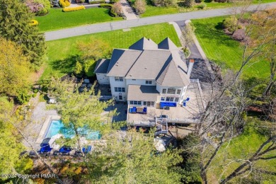 Discover the pinnacle of luxury in the Pocono Mountains of on Great Bear Golf and Country Club in Pennsylvania - for sale on GolfHomes.com, golf home, golf lot