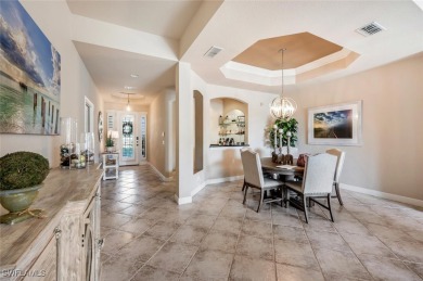 STUNNING TURNKEY FURNISHED LAKEFRONT & GOLF COURSE VIEW Condo in on Shadow Wood Country Club in Florida - for sale on GolfHomes.com, golf home, golf lot