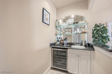 STUNNING TURNKEY FURNISHED LAKEFRONT & GOLF COURSE VIEW Condo in on Shadow Wood Country Club in Florida - for sale on GolfHomes.com, golf home, golf lot
