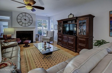 This custom all brick home in the heart of Tellico Village is on Tanasi Golf Course in Tennessee - for sale on GolfHomes.com, golf home, golf lot