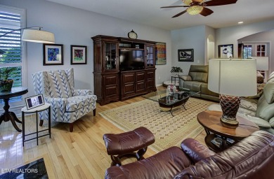 This custom all brick home in the heart of Tellico Village is on Tanasi Golf Course in Tennessee - for sale on GolfHomes.com, golf home, golf lot