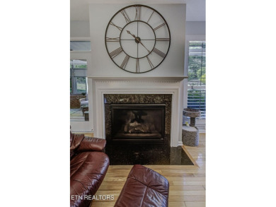 This custom all brick home in the heart of Tellico Village is on Tanasi Golf Course in Tennessee - for sale on GolfHomes.com, golf home, golf lot