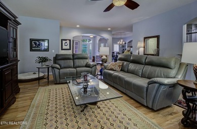 This custom all brick home in the heart of Tellico Village is on Tanasi Golf Course in Tennessee - for sale on GolfHomes.com, golf home, golf lot