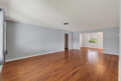 Charming Canal Front 2-Bed, 2-Bath Home with Stunning Upgrades! on Leisureville Community Golf Course in Florida - for sale on GolfHomes.com, golf home, golf lot