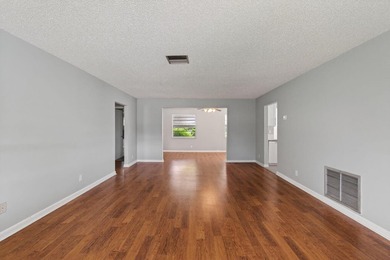 Charming Canal Front 2-Bed, 2-Bath Home with Stunning Upgrades! on Leisureville Community Golf Course in Florida - for sale on GolfHomes.com, golf home, golf lot