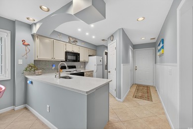 Discover your perfect coastal escape in this wonderful, fully on Surf Golf and Beach Club in South Carolina - for sale on GolfHomes.com, golf home, golf lot