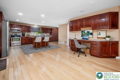 Welcome to this magnificent 3-level residence offering an on Country Club of the Poconos Golf Course in Pennsylvania - for sale on GolfHomes.com, golf home, golf lot