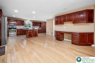 Welcome to this magnificent 3-level residence offering an on Country Club of the Poconos Golf Course in Pennsylvania - for sale on GolfHomes.com, golf home, golf lot