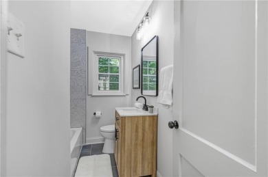 Welcome to 2590 Eastwood Drive, a thoughtfully renovated 3 bed on East Lake Golf Club in Georgia - for sale on GolfHomes.com, golf home, golf lot