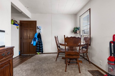 Freshly remodeled 2 bed, 1 bath home blends modern comfort with on Ingersoll Golf Course and Learning Links in Illinois - for sale on GolfHomes.com, golf home, golf lot