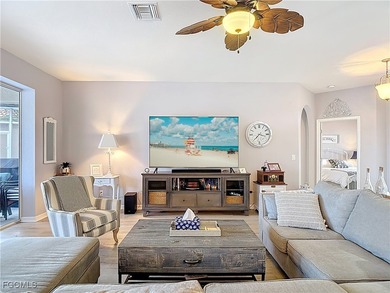 Expanded IBIS II pool home with serene lake and fountain views on Herons Glen Golf and Country Club in Florida - for sale on GolfHomes.com, golf home, golf lot