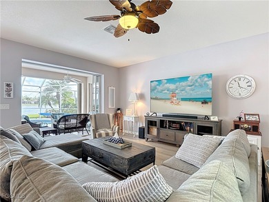 Expanded IBIS II pool home with serene lake and fountain views on Herons Glen Golf and Country Club in Florida - for sale on GolfHomes.com, golf home, golf lot