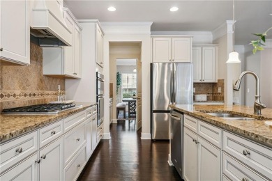 Welcome to this meticulously maintained northeast-facing home in on Sugar Hill Golf Club in Georgia - for sale on GolfHomes.com, golf home, golf lot