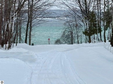 Amazing views of Torch Lake--tuck your dream home on this on A-Ga-Ming Golf Resort in Michigan - for sale on GolfHomes.com, golf home, golf lot