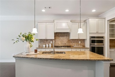 Welcome to this meticulously maintained northeast-facing home in on Sugar Hill Golf Club in Georgia - for sale on GolfHomes.com, golf home, golf lot
