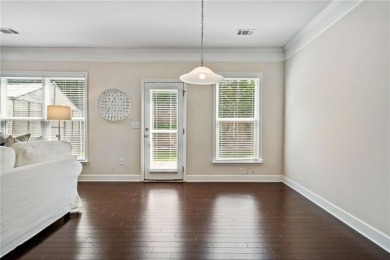 Welcome to this meticulously maintained northeast-facing home in on Sugar Hill Golf Club in Georgia - for sale on GolfHomes.com, golf home, golf lot