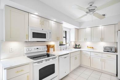 Completely charming villa w/ picturesque lake views! Live on Hunters Run Golf and Country Club in Florida - for sale on GolfHomes.com, golf home, golf lot