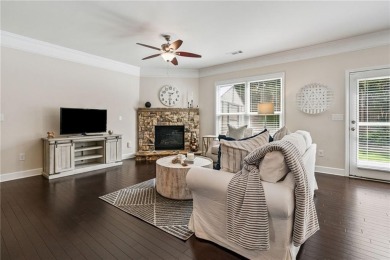 Welcome to this meticulously maintained northeast-facing home in on Sugar Hill Golf Club in Georgia - for sale on GolfHomes.com, golf home, golf lot