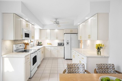 Completely charming villa w/ picturesque lake views! Live on Hunters Run Golf and Country Club in Florida - for sale on GolfHomes.com, golf home, golf lot