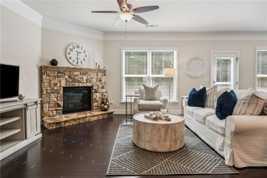 Welcome to this meticulously maintained northeast-facing home in on Sugar Hill Golf Club in Georgia - for sale on GolfHomes.com, golf home, golf lot