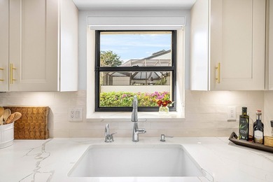 Completely charming villa w/ picturesque lake views! Live on Hunters Run Golf and Country Club in Florida - for sale on GolfHomes.com, golf home, golf lot