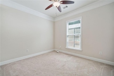 Welcome to this meticulously maintained northeast-facing home in on Sugar Hill Golf Club in Georgia - for sale on GolfHomes.com, golf home, golf lot