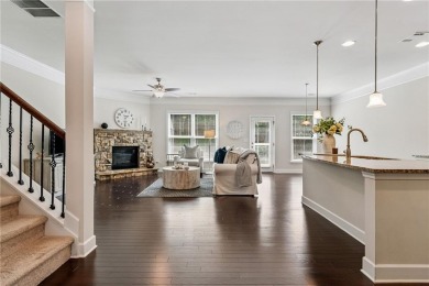 Welcome to this meticulously maintained northeast-facing home in on Sugar Hill Golf Club in Georgia - for sale on GolfHomes.com, golf home, golf lot