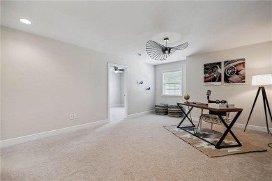 Welcome to this meticulously maintained northeast-facing home in on Sugar Hill Golf Club in Georgia - for sale on GolfHomes.com, golf home, golf lot