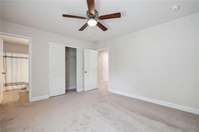 Welcome to this meticulously maintained northeast-facing home in on Sugar Hill Golf Club in Georgia - for sale on GolfHomes.com, golf home, golf lot