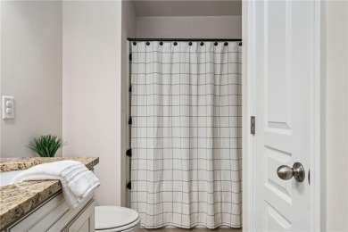 Welcome to this meticulously maintained northeast-facing home in on Sugar Hill Golf Club in Georgia - for sale on GolfHomes.com, golf home, golf lot