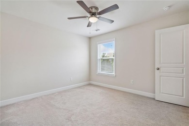 Welcome to this meticulously maintained northeast-facing home in on Sugar Hill Golf Club in Georgia - for sale on GolfHomes.com, golf home, golf lot