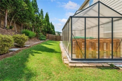 Welcome to this meticulously maintained northeast-facing home in on Sugar Hill Golf Club in Georgia - for sale on GolfHomes.com, golf home, golf lot