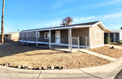 This stunning 2-bedroom, 2-bathroom home has been completely on Country Meadows Golf Club in Arizona - for sale on GolfHomes.com, golf home, golf lot