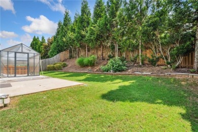 Welcome to this meticulously maintained northeast-facing home in on Sugar Hill Golf Club in Georgia - for sale on GolfHomes.com, golf home, golf lot