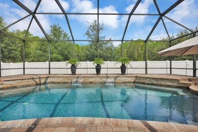 Stunning One-Story Pool Home in the Prestigious Cimarrone Golf & on Cimarrone Golf and Country Club in Florida - for sale on GolfHomes.com, golf home, golf lot