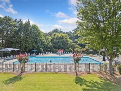 Welcome to this meticulously maintained northeast-facing home in on Sugar Hill Golf Club in Georgia - for sale on GolfHomes.com, golf home, golf lot